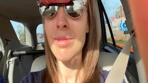 Jo wearing Biopic Glasses learning to drive