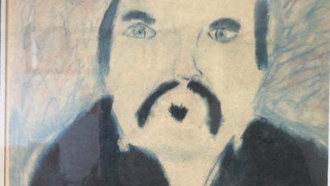 And adorable photo of a portrait by a child of Tim Gooden for Who's who competition in a local paper. Portrait is of Tim Gooden with a Eureka Stockade flag pin crossed with an Irish flag.