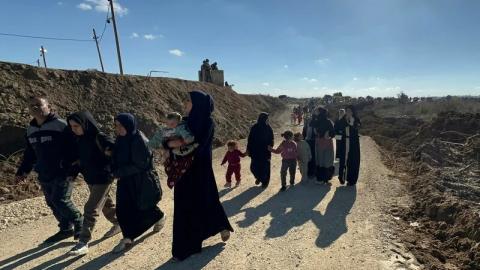 Palestinians near the Netzarim corridor, 27 January 2025. Omar AshtawyAPAimages