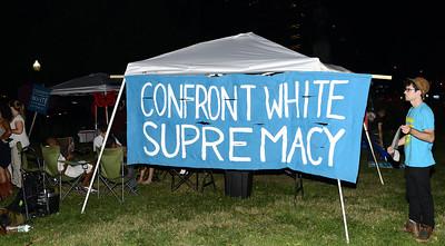 Confront white supremacy banner