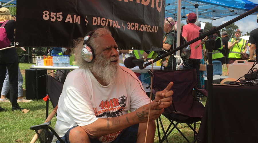 Talgium Edwards broadcasting from the Aboriginal Tent Embassy 50th Anniversary.